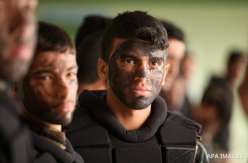 Palestinian students demonstrate their skills during a military-style show at a school in Rafah in the southern Gaza Strip March 28, 2016. Photo by Ashraf Amra