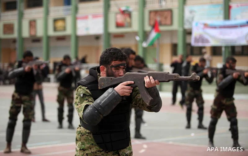 Palestinian students demonstrate their skills during a military-style show at a school in Rafah in the southern Gaza Strip March 28, 2016. Photo by Ashraf Amra