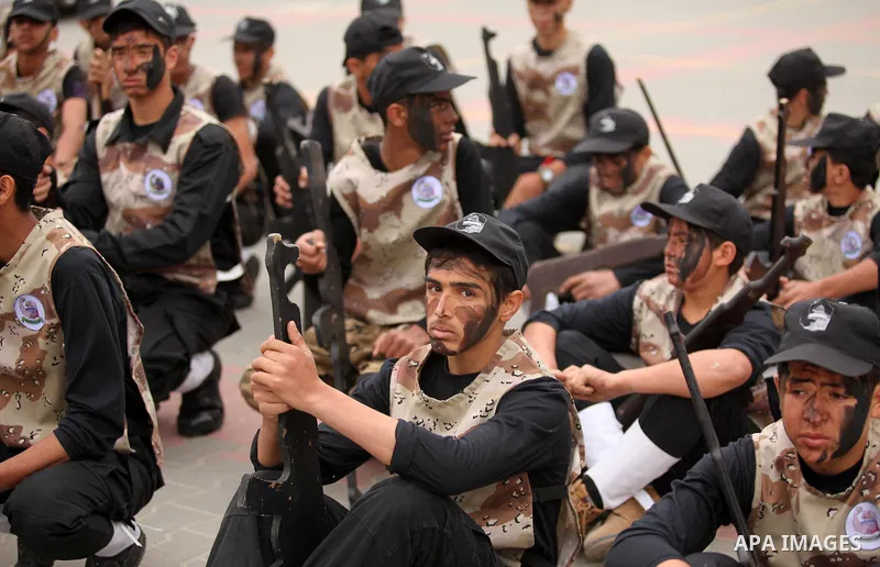 Palestinian students demonstrate their skills during a military-style show at a school in Rafah in the southern Gaza Strip March 28, 2016. Photo by Ashraf Amra
