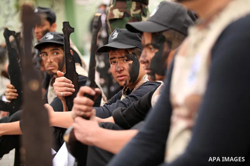 Palestinian students demonstrate their skills during a military-style show at a school in Rafah in the southern Gaza Strip March 28, 2016. Photo by Ashraf Amra