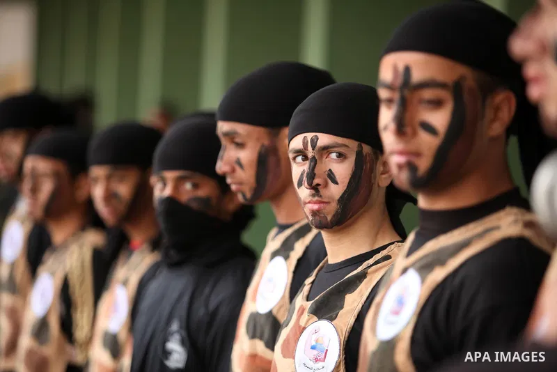 Palestinian students demonstrate their skills during a military-style show at a school in Rafah in the southern Gaza Strip March 28, 2016. Photo by Ashraf Amra