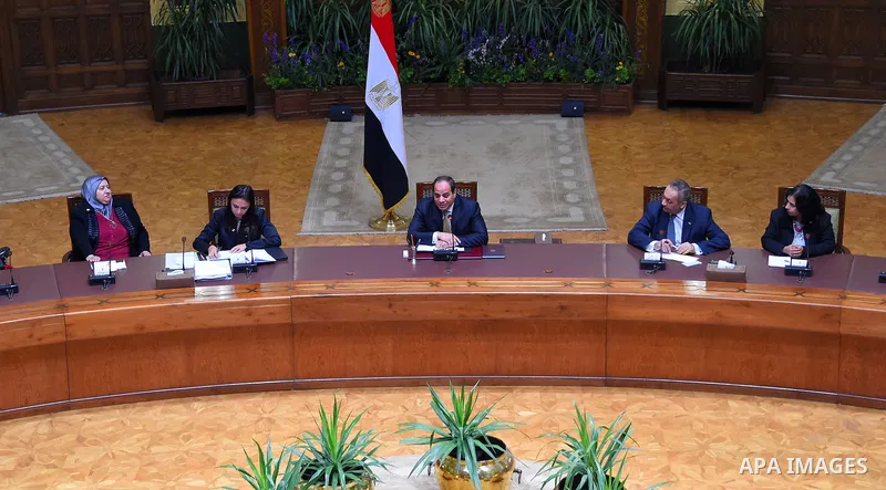 Egyptian President Abdel-Fattah al-Sisi meets with Members of the National Council for Women, in Cairo, capital of Egypt, March 28, 2016. Photo by Egyptian President Office