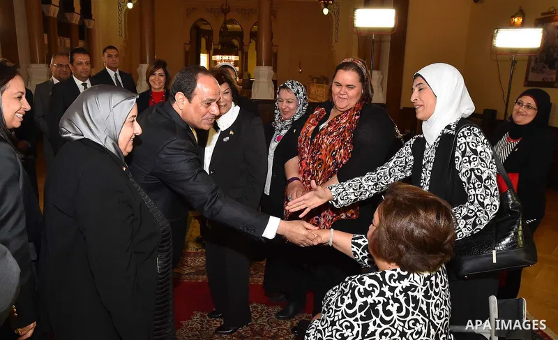 Egyptian President Abdel-Fattah al-Sisi meets with Members of the National Council for Women, in Cairo, capital of Egypt, March 28, 2016. Photo by Egyptian President Office
