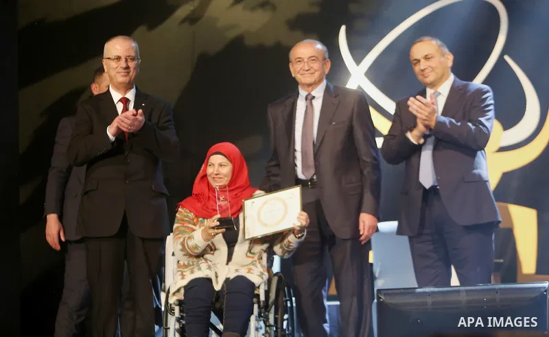Palestinian Prime Minister Rami Hamdallah attends the Ceremony of Palestine International Award for Excellence and Creativity at al-Najah University, in the West Bank city of Nablus on March 29, 2016. Photo by Prime Mini...