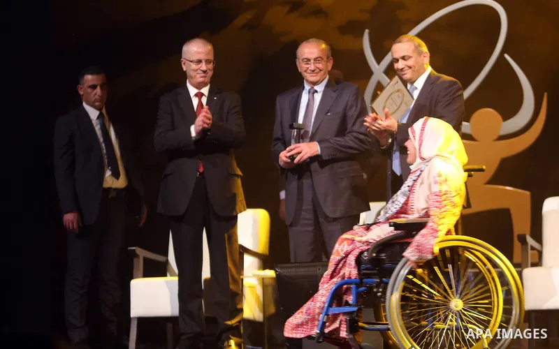 Palestinian Prime Minister Rami Hamdallah attends the Ceremony of Palestine International Award for Excellence and Creativity at al-Najah University, in the West Bank city of Nablus on March 29, 2016. Photo by Prime Mini...