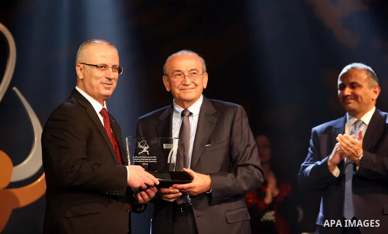 Palestinian Prime Minister Rami Hamdallah attends the Ceremony of Palestine International Award for Excellence and Creativity at al-Najah University, in the West Bank city of Nablus on March 29, 2016. Photo by Prime Mini...