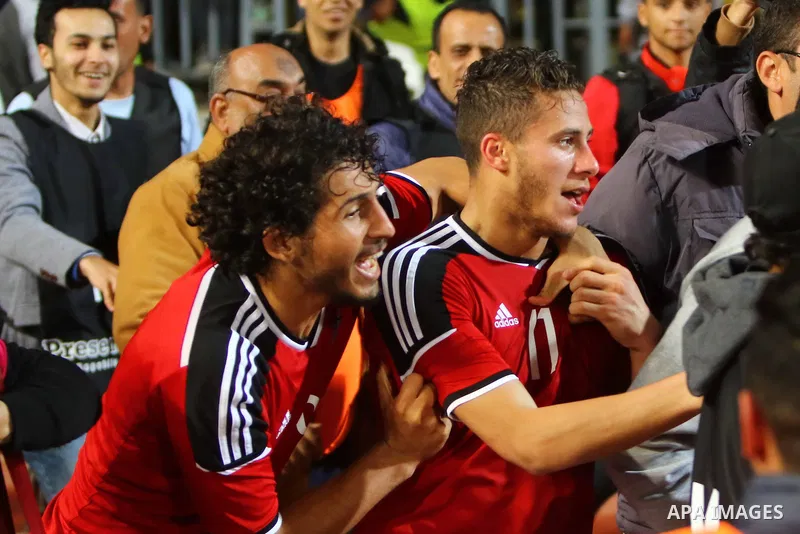 Egyptian players and Nigerian players compete during their African Cup of Nations group G qualification football match between Egypt and Nigeria at the Borg el-Arab Stadium in Alexandria on March 29, 2016. Photo by Strin...