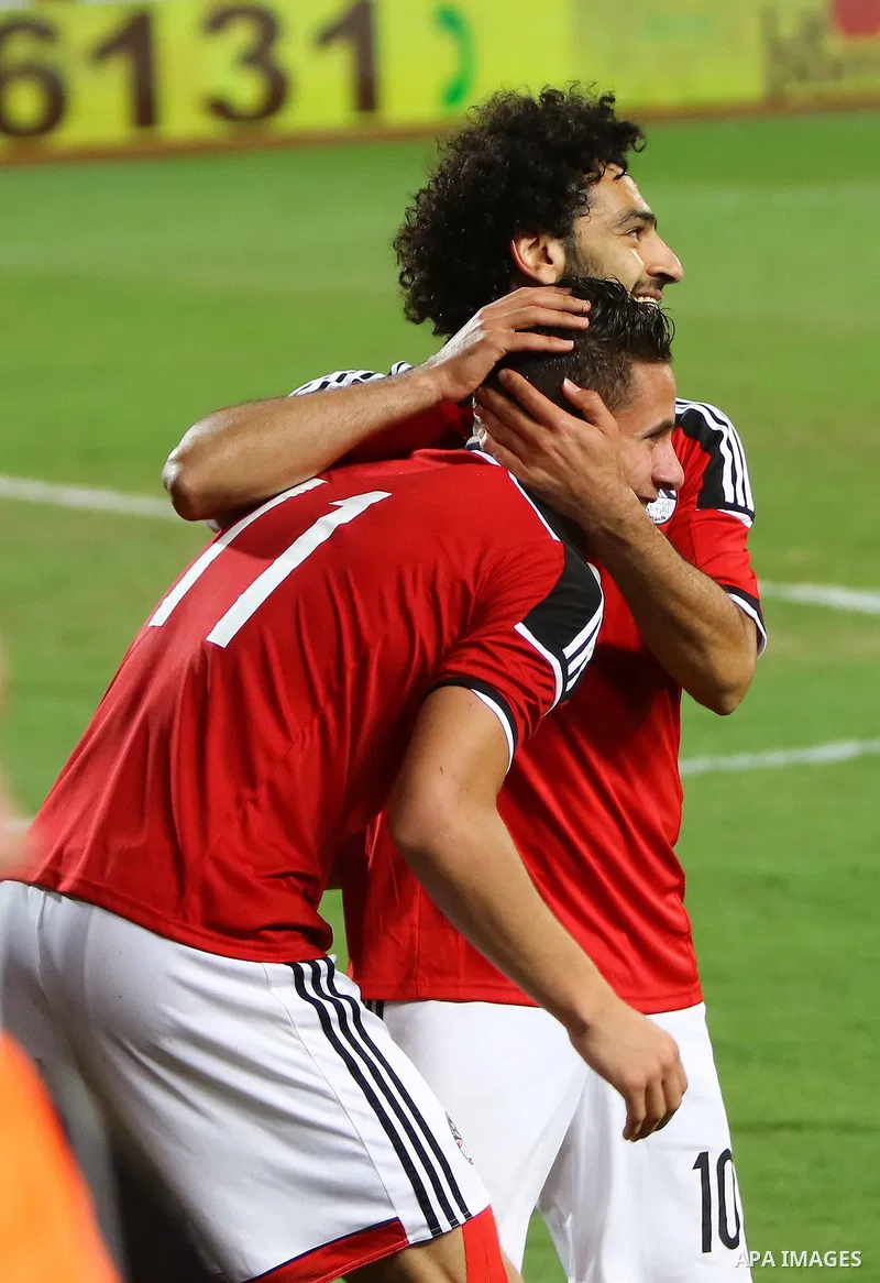 Egyptian players and Nigerian players compete during their African Cup of Nations group G qualification football match between Egypt and Nigeria at the Borg el-Arab Stadium in Alexandria on March 29, 2016. Photo by Strin...