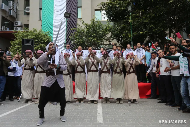 Palestinians take part in a rally marking Land Day, in Gaza City March 30, 2016. March 30 marks Land Day, the annual commemorations of the killing by police of six Arab citizens in 1976 during protests against land confi...