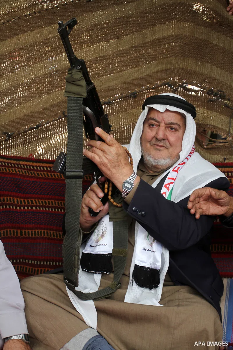 Palestinian men gather in a tent to mark Land Day on March 30, 2016, in Khan Yunis, in the southern Gaza Strip, as Palestinians mark Land Day. March 30 marks Land Day, the annual commemorations of the killing by police o...