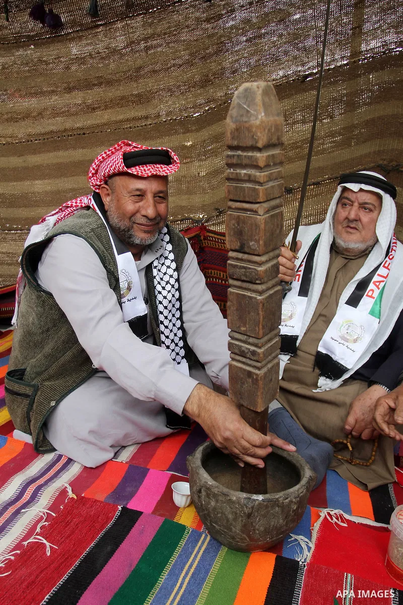 Palestinian men gather in a tent to mark Land Day on March 30, 2016, in Khan Yunis, in the southern Gaza Strip, as Palestinians mark Land Day. March 30 marks Land Day, the annual commemorations of the killing by police o...
