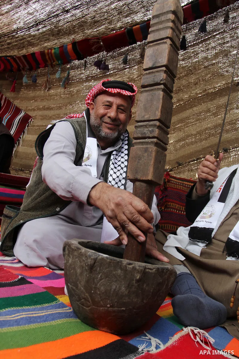 Palestinian men gather in a tent to mark Land Day on March 30, 2016, in Khan Yunis, in the southern Gaza Strip, as Palestinians mark Land Day. March 30 marks Land Day, the annual commemorations of the killing by police o...