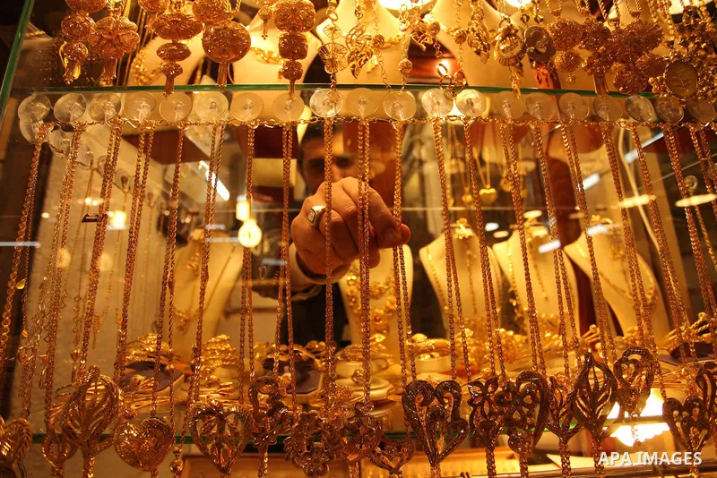 A Palestinian man displays jewellery at his jewellery store in Gaza city on March 30, 2016. The director of the Palestinian Authority’s borders and crossings department, Nathmi Muhanna said that Israeli authorities notif...