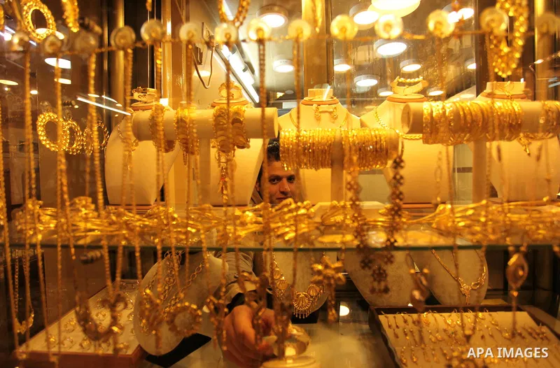 A Palestinian man displays jewellery at his jewellery store in Gaza city on March 30, 2016. The director of the Palestinian Authority’s borders and crossings department, Nathmi Muhanna said that Israeli authorities notif...