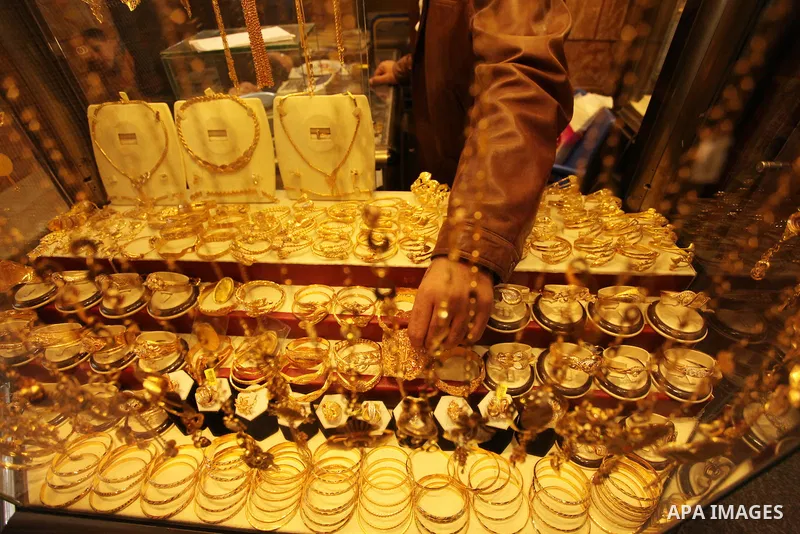 A Palestinian man displays jewellery at his jewellery store in Gaza city on March 30, 2016. The director of the Palestinian Authority’s borders and crossings department, Nathmi Muhanna said that Israeli authorities notif...