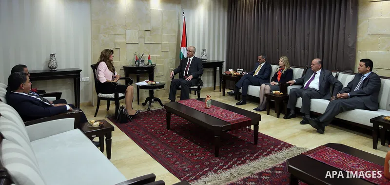 Palestinian Prime Minister, Rami Hamdallah, meerts with Director General of the King Hussein Cancer Foundation, Princess, Dina Mired, in the West Bank city of Ramallah, on March 31, 2016. Photo by Prime Minister Office
