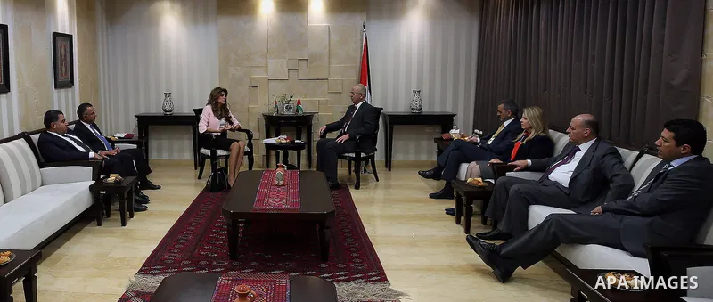 Palestinian Prime Minister, Rami Hamdallah, meerts with Director General of the King Hussein Cancer Foundation, Princess, Dina Mired, in the West Bank city of Ramallah, on March 31, 2016. Photo by Prime Minister Office