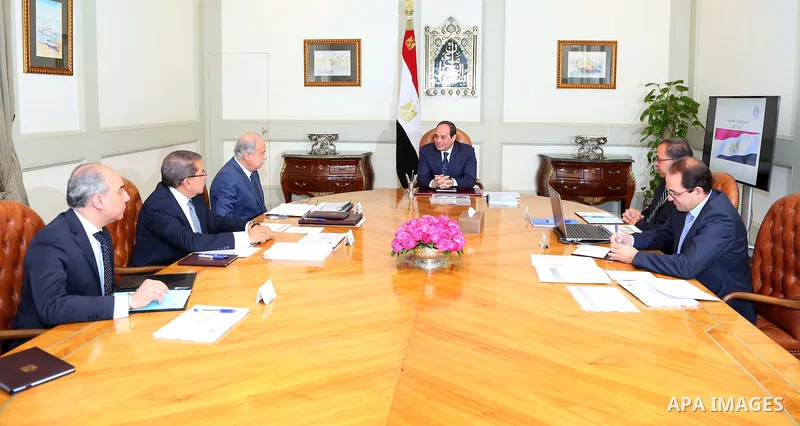 Egyptian President Abdel Fattah al-sisi meets with Egyptian Prime Minister Sharif Ismail in Cairo, Egypt on March 31, 2016. Photo by Egyptian President Office