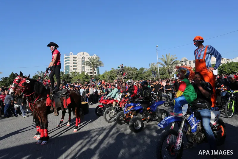 Palestinians participate in a cultural carnival organized by Gaza Municipality in Gaza City April 1, 2016. Photo by Mohammed Asad