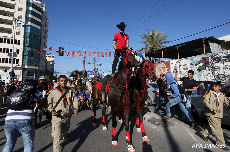 Palestinians participate in a cultural carnival organized by Gaza Municipality in Gaza City April 1, 2016. Photo by Mohammed Asad
