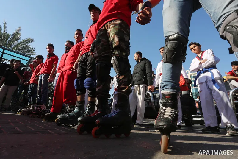 Palestinians participate in a cultural carnival organized by Gaza Municipality in Gaza City April 1, 2016. Photo by Mohammed Asad
