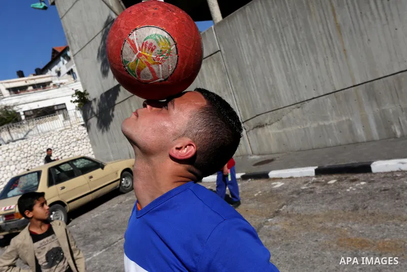 Palestinians participate in a cultural carnival organized by Gaza Municipality in Gaza City April 1, 2016. Photo by Mohammed Asad