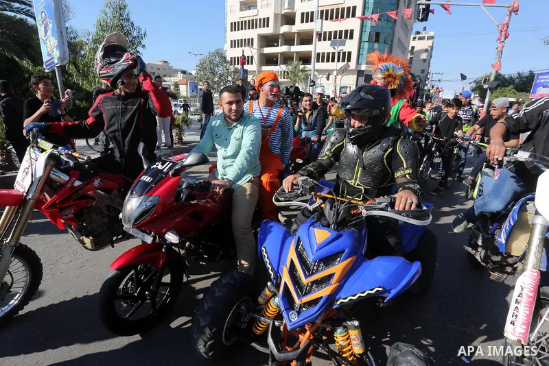Palestinians participate in a cultural carnival organized by Gaza Municipality in Gaza City April 1, 2016. Photo by Mohammed Asad