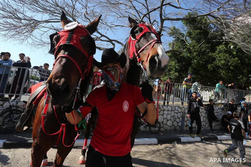 Palestinians participate in a cultural carnival organized by Gaza Municipality in Gaza City April 1, 2016. Photo by Mohammed Asad