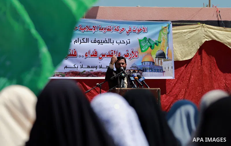 Mushir Al Masri, a Hamas MP and media spokesman speaks during a rally marking Land Day, near Eriz crossing in the northern Gaza Strip, on April 2, 2016. Photo by Yasser Qudih