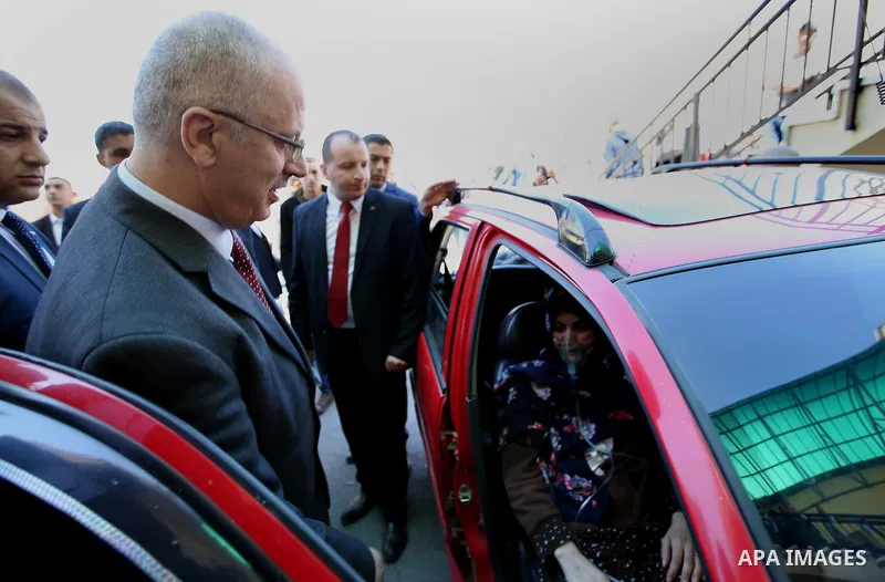 Palestinian Prime Minister, Rami Hamdallah, attends the inauguration ceremony of the Central Medical Stores, funded by the French Development Agency, in the West Bank city of Nablus, on April 2, 2016. Photo by Prime Mini...