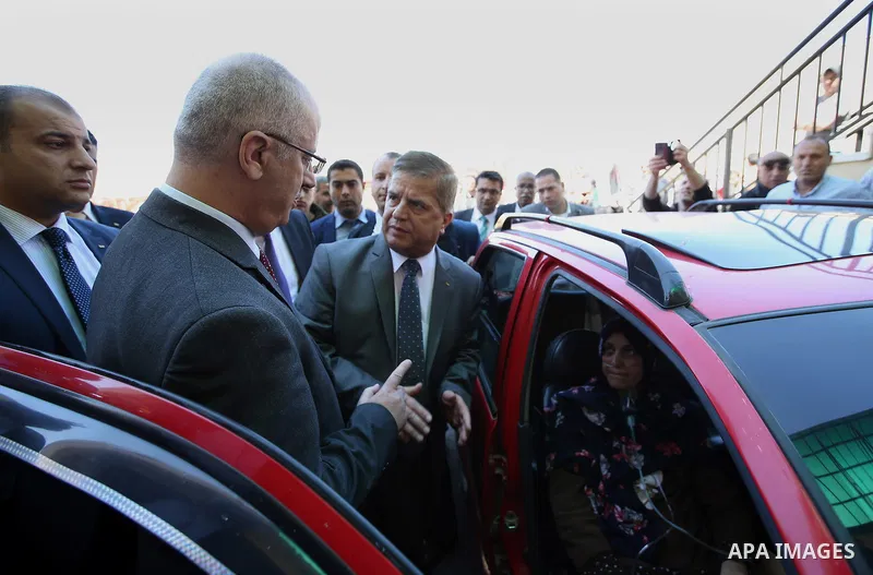 Palestinian Prime Minister, Rami Hamdallah, attends the inauguration ceremony of the Central Medical Stores, funded by the French Development Agency, in the West Bank city of Nablus, on April 2, 2016. Photo by Prime Mini...