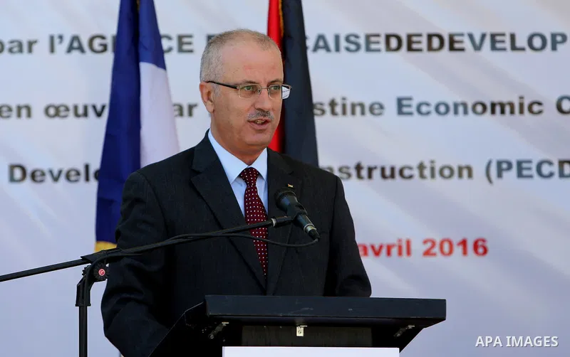 Palestinian Prime Minister, Rami Hamdallah, attends the inauguration ceremony of the Central Medical Stores, funded by the French Development Agency, in the West Bank city of Nablus, on April 2, 2016. Photo by Prime Mini...