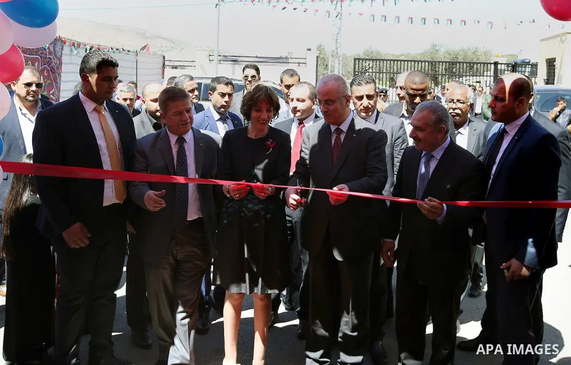 Palestinian Prime Minister, Rami Hamdallah, attends the inauguration ceremony of the Central Medical Stores, funded by the French Development Agency, in the West Bank city of Nablus, on April 2, 2016. Photo by Prime Mini...
