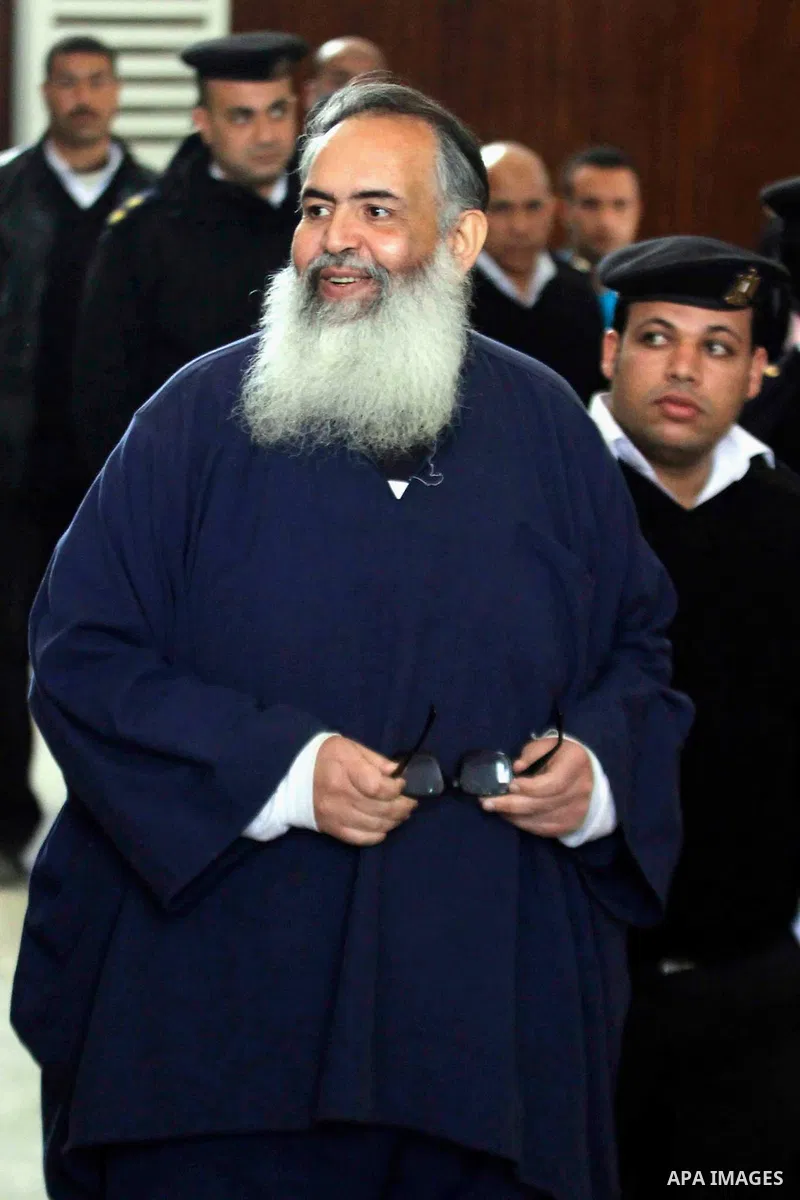 Egypt's Salafi leader and former presidential candidate Hazem Salah Abu Ismail attends his trial in Cairo on April 2, 2016. An egyptian court considers today, Saturday the first trial session of Salafist preacher Hazem S...