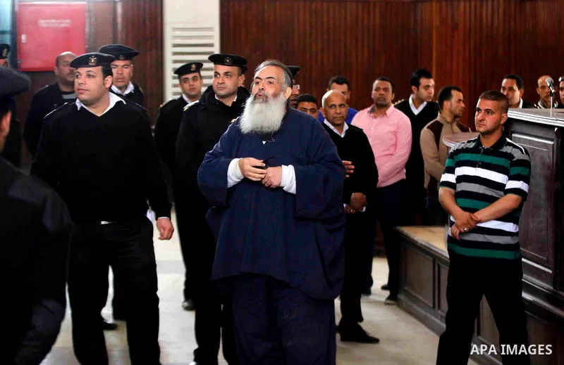 Egypt's Salafi leader and former presidential candidate Hazem Salah Abu Ismail attends his trial in Cairo on April 2, 2016. An egyptian court considers today, Saturday the first trial session of Salafist preacher Hazem S...