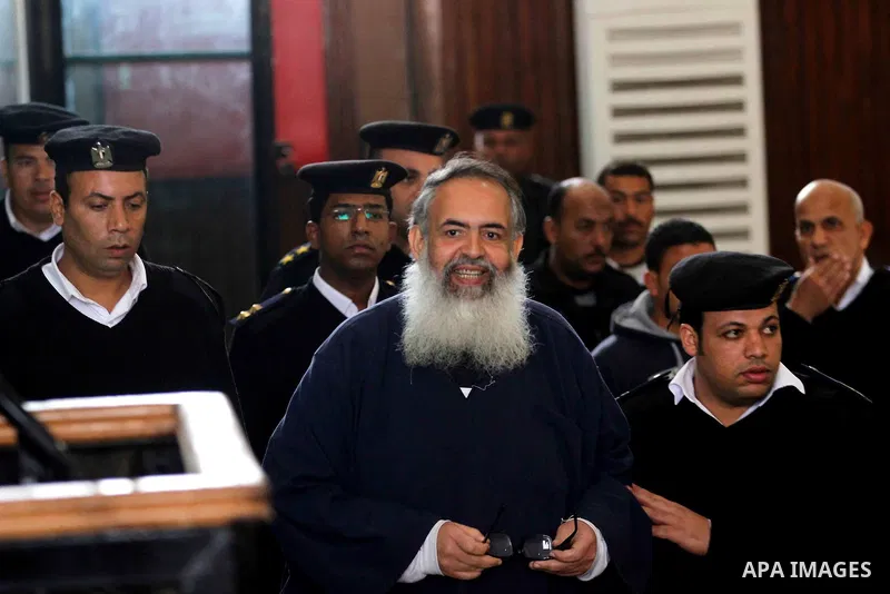 Egypt's Salafi leader and former presidential candidate Hazem Salah Abu Ismail attends his trial in Cairo on April 2, 2016. An egyptian court considers today, Saturday the first trial session of Salafist preacher Hazem S...
