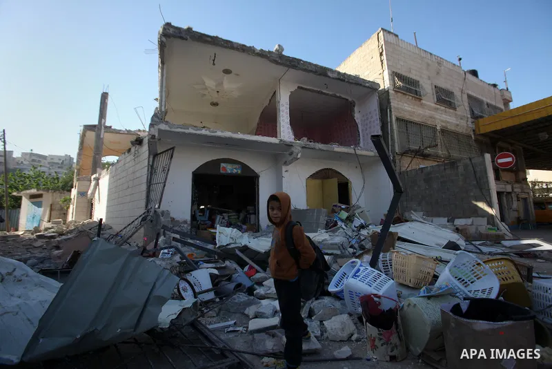 Palestinians inspect the rubble of of their house that were demolished by the Israeli bulldozers, in the village of Qabatiya south of Jenin, on April 4, 2016. The three Palestinians to whom the houses belonged were shot...