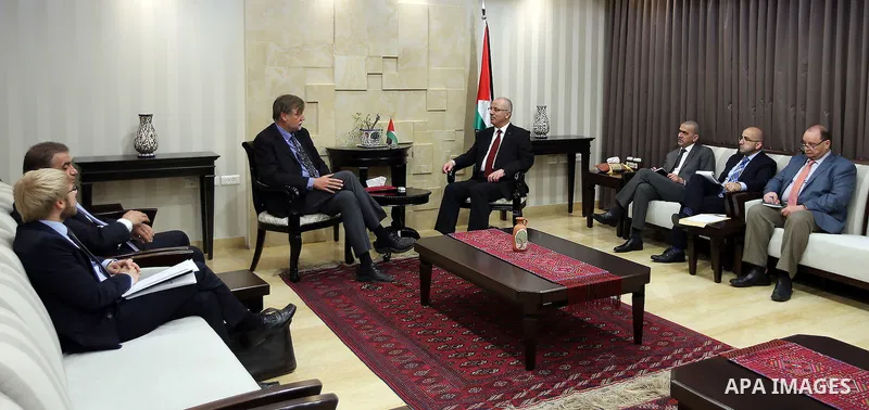 Palestinian Prime Minister Rami Hamdallah meets with World Bank representative in Palestine Sting Jensen in the West Bank city of Ramallah on April 04, 2016. Photo by Prime Minister Office