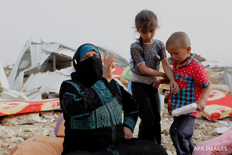 Palestinians inspect the rubble of a house that was demolished by Israeli bulldozers in the West Bank village of Um Alkahiar, South of Hebron 06 April 2016. Israeli forces on Wednesday demolished six structures in Khirbe...