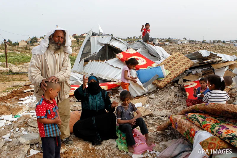 Palestinians inspect the rubble of a house that was demolished by Israeli bulldozers in the West Bank village of Um Alkahiar, South of Hebron 06 April 2016. Israeli forces on Wednesday demolished six structures in Khirbe...