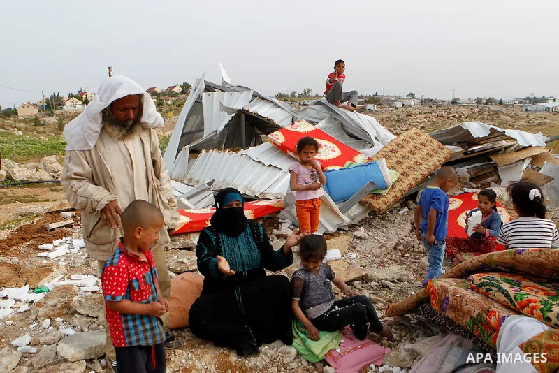 Palestinians inspect the rubble of a house that was demolished by Israeli bulldozers in the West Bank village of Um Alkahiar, South of Hebron 06 April 2016. Israeli forces on Wednesday demolished six structures in Khirbe...