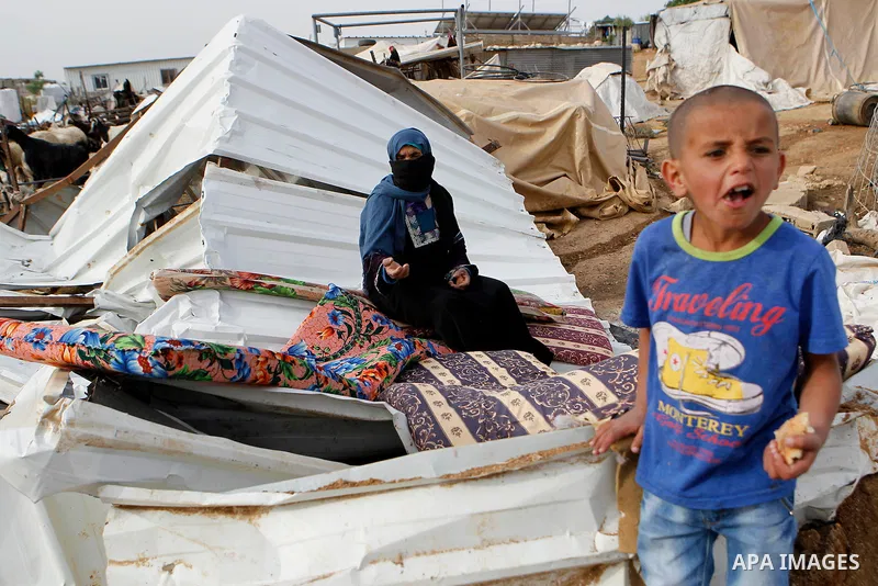 Palestinians inspect the rubble of a house that was demolished by Israeli bulldozers in the West Bank village of Um Alkahiar, South of Hebron 06 April 2016. Israeli forces on Wednesday demolished six structures in Khirbe...