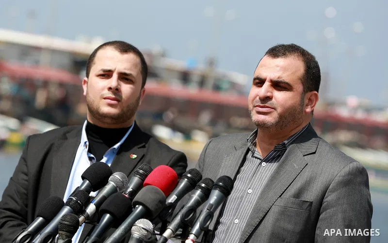 A spokesman for the "National Commission to break the siege and reconstruction, Alaa El-Batta speaks during a press conference in Gaza seaport, on April 6, 2016. Photo by Mohammed Asad