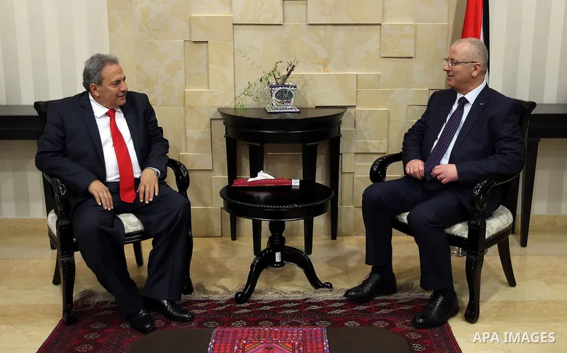 Palestinian Prime Minister, Rami Hamdallah, meet with, Constitutional Court Chairman Alhaji Mohammed Qasim, in the West Bank city of Ramallah, on April 7, 2016. Photo by Prime Minister Office