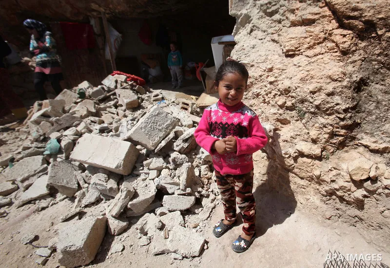 Palestinians inspect the rubble of a house that was demolished by Israeli bulldozers in the West Bank village of Khirbet Tana, south east of Nablus 07 April 2016. Khirbet Tana lies in an Israeli-declared military trainin...