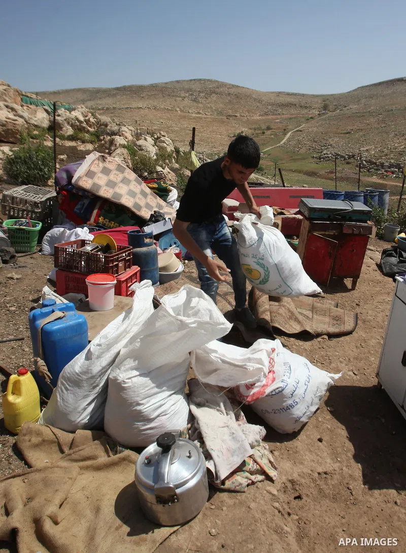 Palestinians inspect the rubble of a house that was demolished by Israeli bulldozers in the West Bank village of Khirbet Tana, south east of Nablus 07 April 2016. Khirbet Tana lies in an Israeli-declared military trainin...