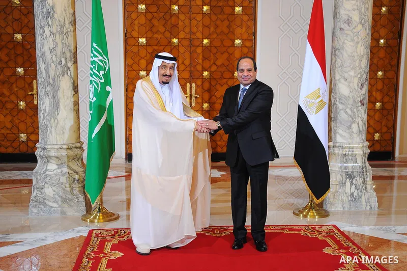Egyptian President Abdel Fattah al-Sisi shake hands with Saudi King Salman bin Abdulaziz in the capital Cairo on April 07, 2016. Saudi King Salman started a five-day visit to Cairo in a show of support for Egyptian Presi...