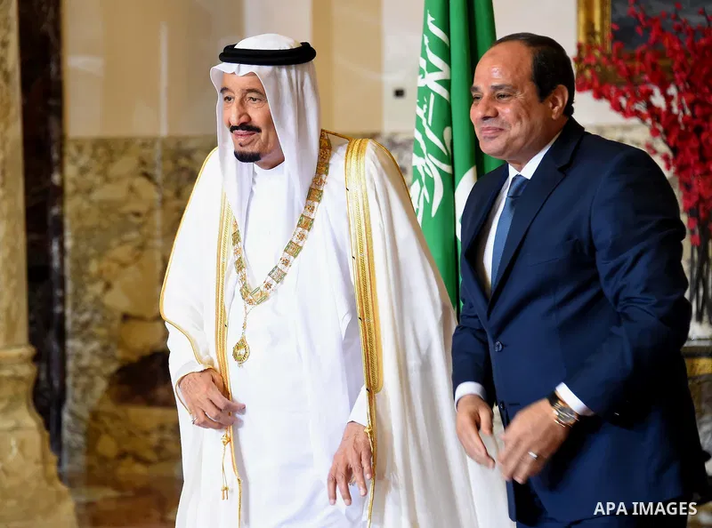 Egyptian President Abdel Fattah al-Sisi honors Saudi King Salman bin Abdulaziz in the capital Cairo on April 08, 2016. Saudi King Salman started a five-day visit to Cairo in a show of support for Egyptian President Abdel...
