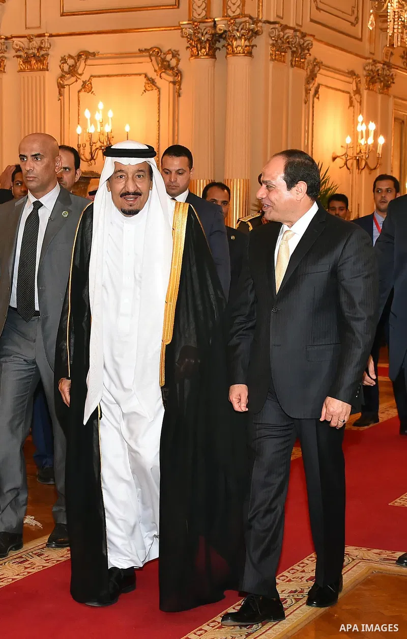 A handout picture released by the Egyptian Presidency on April 10, 2016 shows Egyptian President Abdel Fattah al-Sisi meeting with Saudi King Salman bin Abdulaziz as part of a signing ceremony for bilateral aggrements at...
