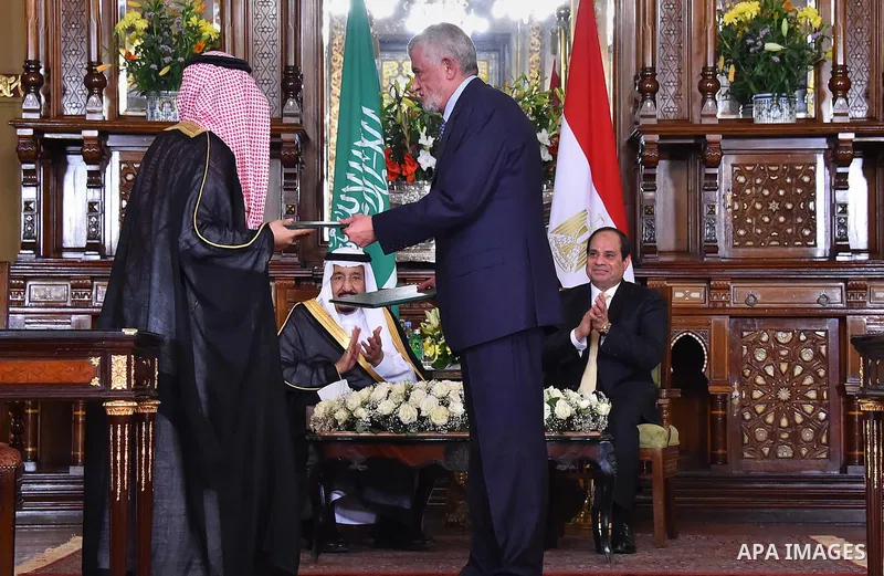 A handout picture released by the Egyptian Presidency on April 10, 2016 shows Egyptian President Abdel Fattah al-Sisi meeting with Saudi King Salman bin Abdulaziz as part of a signing ceremony for bilateral aggrements at...
